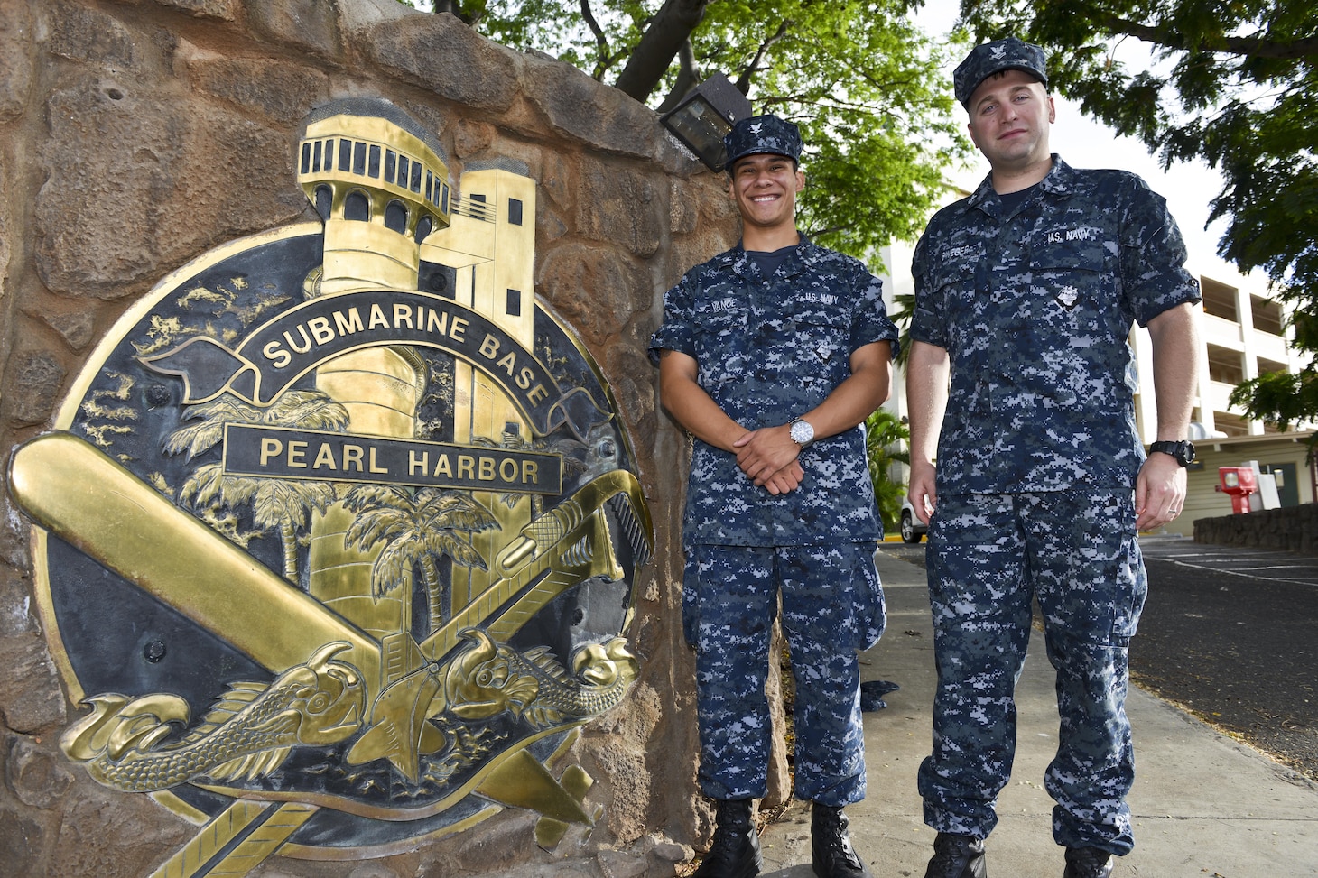 160518-N-LY160-032
JOINT BASE PEARL HARBOR-HICKAM, Hawaii (May 18, 2016) – Hospital Corpsman 3rd Class Michael D. Vance, left, and Hospital Corpsman 2nd Class Seth Sweger, right, behavioral health technicians, pose next to the Submarine Base Pearl Harbor crest at Joint Base Pearl Harbor-Hickam. (U.S. Navy photo by Mass Communication Specialist 2nd Class Michael H. Lee)
