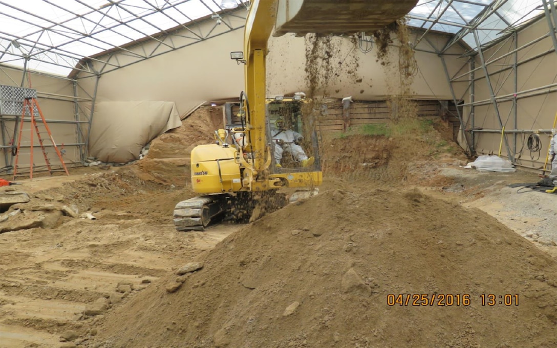 Soil is excavated and sifted for debris as part of cleanup efforts at 4825 Glenbrook Road in Washington, D.C., April 25, 2016. The home at 4825 Glenbrook Road was demolished in 2012 and crews removed soil and aspects of the home down to bedrock as part of a cleanup effort of the property, which was part of the former American University Experiment Station where the Army researched and tested chemical weapons during World War I.