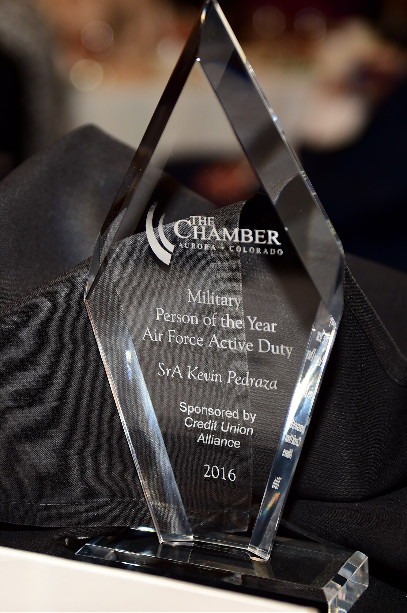 Local Colorado businesses present Service members with trophies May 13, 2016 during the annual Armed Forces Recognition Luncheon at the Doubletree Stapleton Hotel in Denver. Commanders and units worked with the Aurora Chamber of Commerce to select the top junior enlisted Army, Navy, Marine Corps, Air Force, and Coast Guard Service members. (U.S. Air Force photo by Airman 1st Class Gabrielle Spradling/Released)