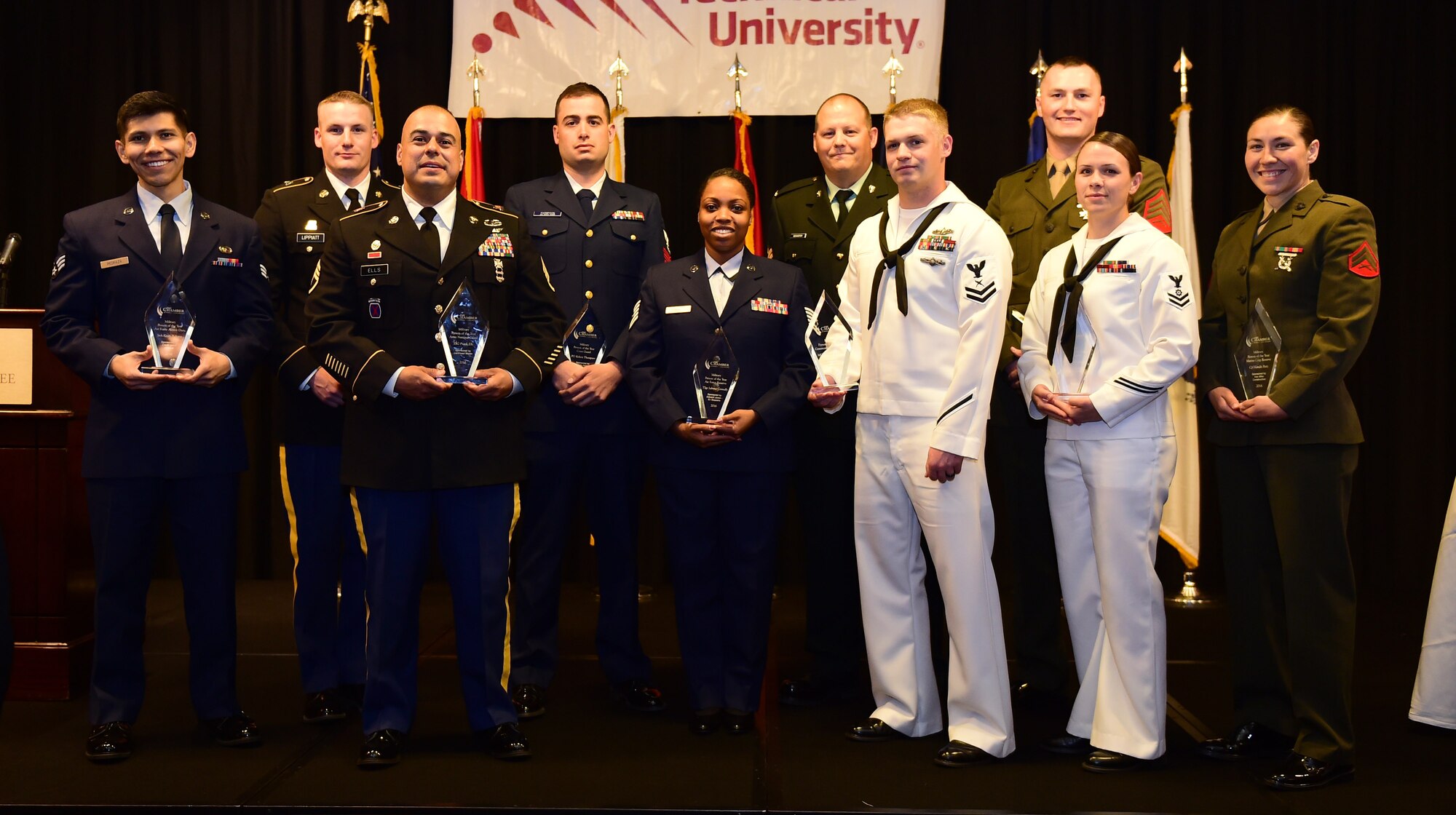 Award winners stand together May 13, 2016, after the Armed Forces Recognition Luncheon at the Doubletree Stapleton Hotel in Denver. The Aurora Chamber of Commerce along with local businesses hosts the annual lunch to recognize and honor the growing number of active duty, guard and reserve Service members throughout the area. (U.S. Air Force photo by Airman 1st Class Gabrielle Spradling/Released)