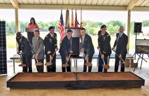 David Williams, Chip Marin, Maj. Gen. Ted Harrison, Bill Kelly, Richard Kidd, Col. Bill Marks and Michael McGhee symbolically break ground on Redstone Arsenal's solar project June 3.