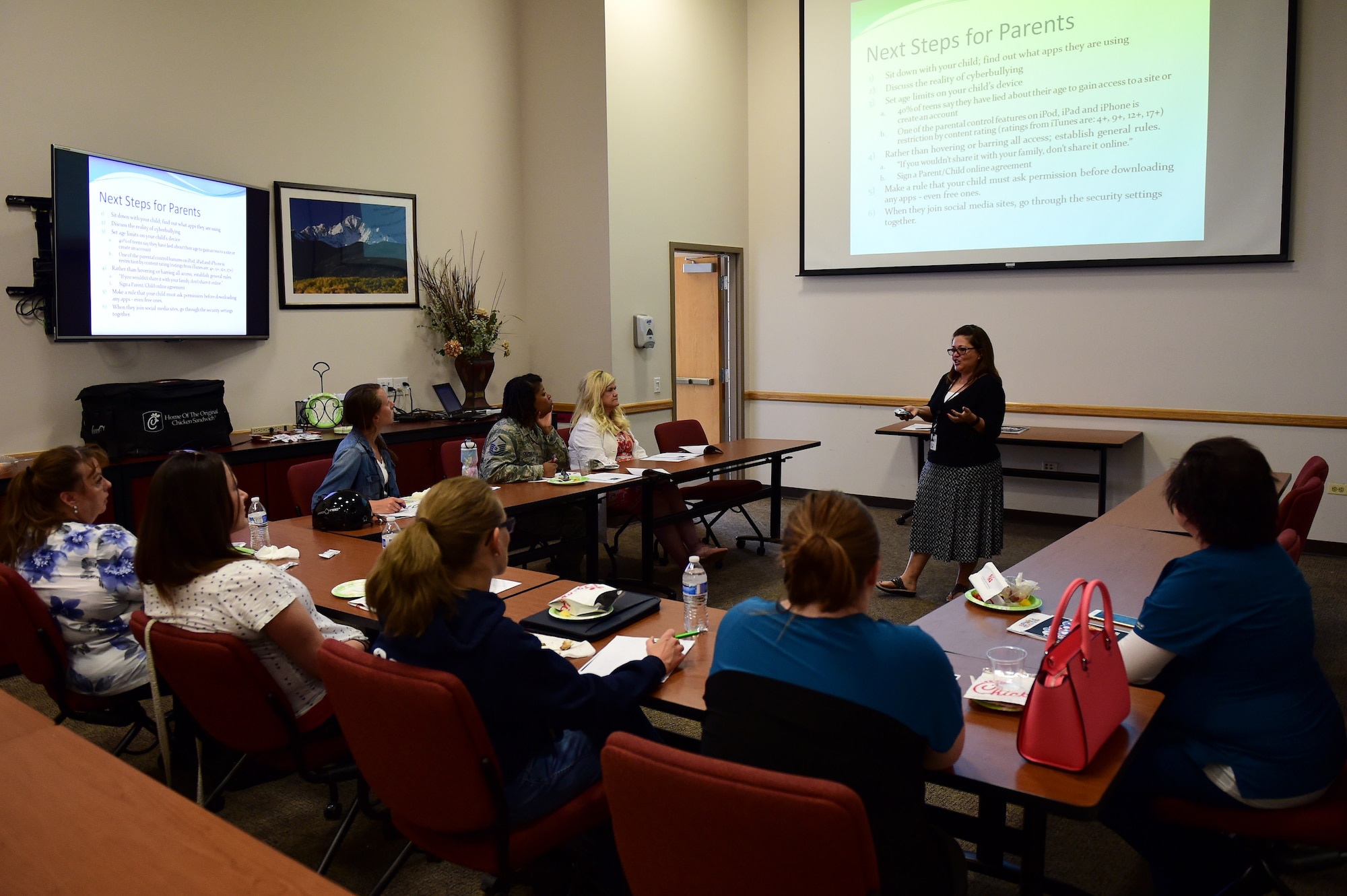 Brandi Ruiz, Buckley Airman & Family Readiness Center community readiness consultant, speaks May 19, 2016, during a Hearts Apart event on Buckley Air Force Base, Colo. The event focused on social media dangers and how to talk with children about the dos and don’ts of social media. (U.S. Air Force photo by Airman 1st Class Gabrielle Spradling/Released)