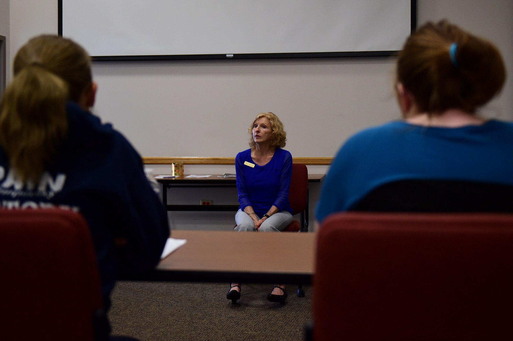 Cindy Darugna, Buckley Airman & Family Readiness Center Military Family Life counselor, speaks May 19, 2016, during a Hearts Apart event on Buckley Air Force Base, Colo. The MFLC program provides many services to Service members and their families, including non-medical short-term and situational problem-solving counseling. (U.S. Air Force photo by Airman 1st Class Gabrielle Spradling/Released)