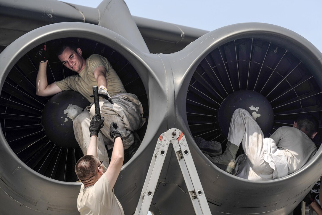 Airmen conduct a post-flight inspection on a B-52 Stratofortress at Andersen Air Force Base, Guam, June 2, 2016. Air Force photo by Airman 1st Class Alexa Ann Henderson