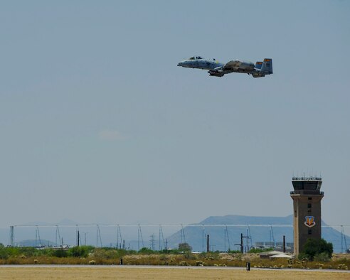 An A-10C Thunderbolt II from the 357th Fighter Squadron flies over the flight line during Hawgsmoke 2016 at Davis-Monthan Air Force Base, Ariz., June 1, 2016. D-M hosted this year’s biennial competition comprised of nearly 50 A-10s from across the country. (U.S. Air Force photo by Airman 1st Class Ashley N. Steffen/Released)