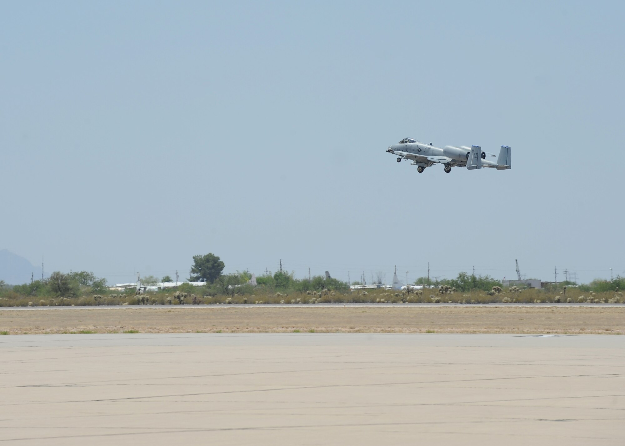 An A-10C Thunderbolt II from the 23rd Fighter Group, Moody Air Force Base, Ga., retracts its landing gear after taking off from Davis-Monthan Air Force Base, Ariz., June 2, 2016. D-M hosted the biennial competition which scores strafing accuracy, high-altitude dive-bombing, low-angle high-delivery, Maverick missile precision and team tactics. (U.S. Air Force photo by Airman 1st Class Ashley N. Steffen/Released)