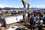 Spectators crowd around the official weigh-in point for the 10th Annual Armed Services Combat Fishing Tournament in Seward, Alaska, May 26. The tournament, hosted by the city of Seward and the Armed Services YMCA, gave more than 200 military anglers stationed in Alaska a free day of halibut fishing to thank them for their service. 