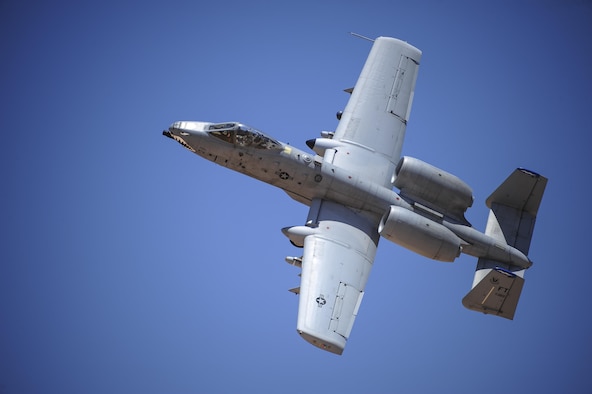 An A-10C Thunderbolt II assigned to the 23rd Fighter Group, Moody AFB, Ga., banks left after performing a low-angle strafe during the Hawgsmoke 2016 competition at the Barry M. Goldwater Range, Ariz., June 2, 2016. The competition took place over the course of two days and included individual and team scoring of strafing, high-altitude dive-bombing, Maverick missile precision and team tactics. (U.S. Air Force photo by Senior Airman Chris Drzazgowski/Released)
