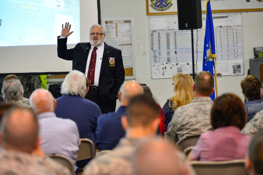 Retired Col. Robert King, former 436th Mission Support Group commander, speaks at the 436th Aerial Port Squadron 50th Anniversary Celebration May 20, 2016, inside of the aerial port on Dover Air Force Base, Del. King spoke about the diverse history of the aerial port from the past 50 years and thanked all previous and current port dawgs for their service. (U.S. Air Force photo/Senior Airman William Johnson)