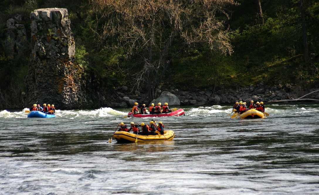 Fairchild Air Force Base Airmen raft down the Spokane River, during a Base Chapel resilience trip April 16, 2016, Spokane, Wash. The trip gave Airmen an opportunity to focus on resilience and the five wellness pillars; social, spiritual, physical, and mental. The chapel hosts different trips during the year to include: white water rafting, zip lining and rock climbing. (Courtesy Photo)