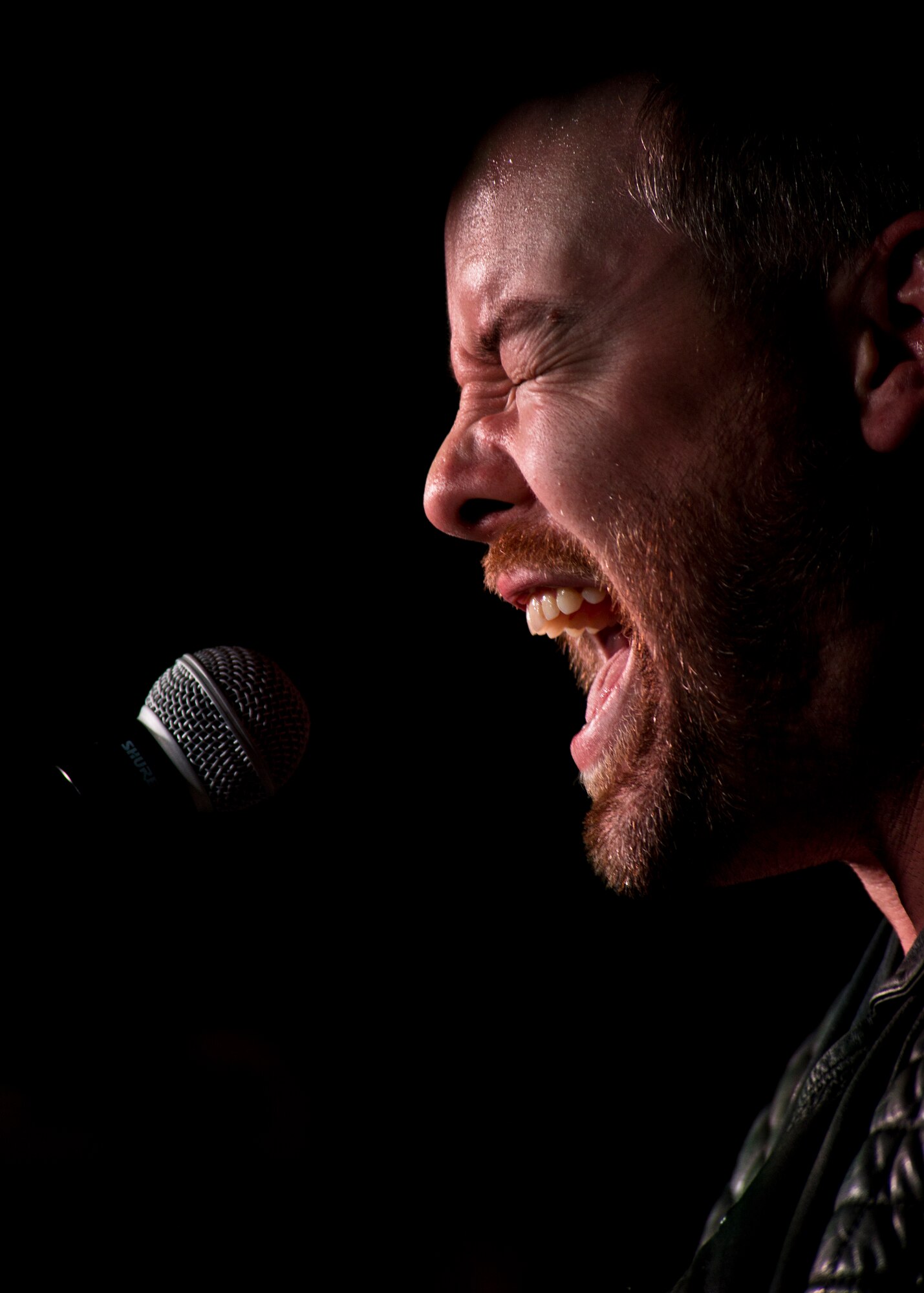 David Cook performs for military members and their families at Minot Air Force Base, N.D., May 30, 2016. The 2008 American Idol winner performed tracks from his most recent album and popular songs by Michael Jackson and Led Zeppelin. (U.S. Air Force photo/Airman 1st Class J.T. Armstrong)