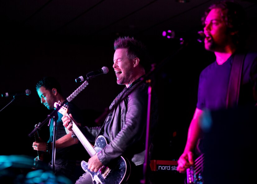 David Cook and his band perform for military members and their families at Minot Air Force Base, N.D., May 30, 2016. The 2008 American Idol winner performed tracks from his most recent album and popular songs by Michael Jackson and Led Zeppelin. (U.S. Air Force photo/Airman 1st Class J.T. Armstrong)