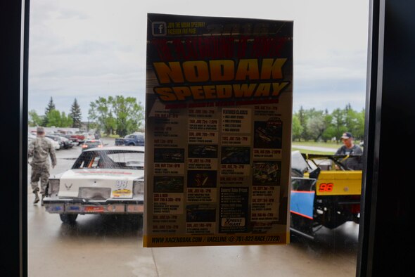 Drivers from the NoDak Speedway in Minot, N.D., visited Minot Air Force Base May 25, 2016. Drivers were displaying cars, did some giveaways and informed Team Minot of the speedway events this summer and on May 30 for Military Appreciation Day. (U.S. Air Force photo/Airman 1st Class Jessica Weissman)