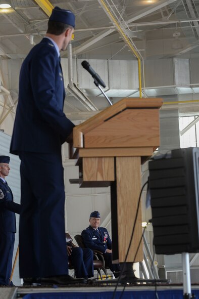 Col. Jason Armagost looks on as Col. Matthew Brooks, 5th Bomb Wing commander, gives a speech during their change of command ceremony at Minot Air Force Base, N.D., June 3, 2016. Brooks recently served as the vice wing commander at Whiteman Air Force Base, Mo., and comes to Minot with knowledge of the Rockwell B-1 Lancer and the Northrop Grumman B-2 Spirit. (U.S. Air Force photo/Airman 1st Class Jessica Weissman)
