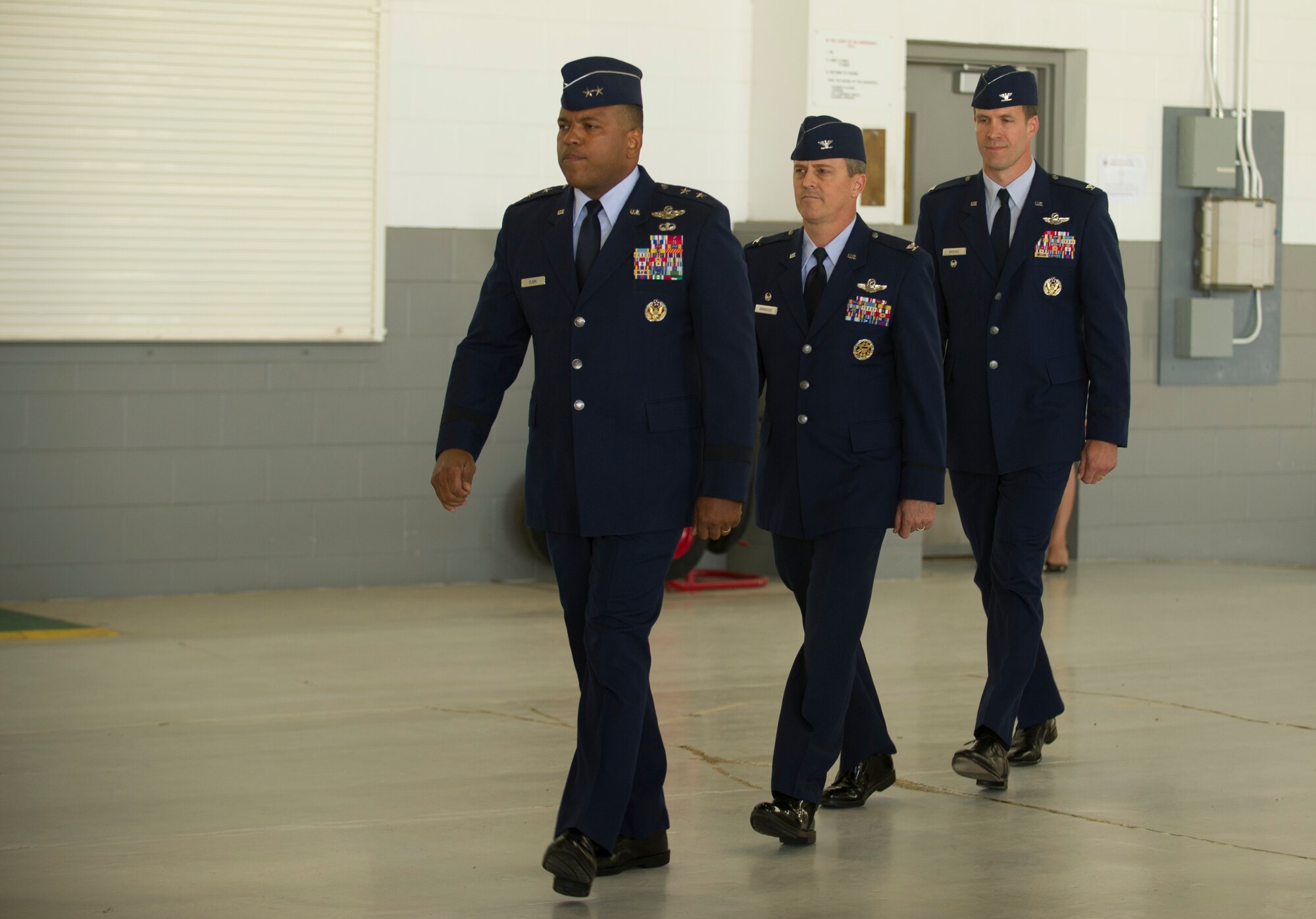 The official party arrives during the 5th Bomb Wing change of command ceremony at Minot Air Force Base, N.D., June 3, 2016. Col. Matthew Brooks accepted command from Col. Jason Armagost as the new 5th BW commander . (U.S. Air Force photo/Senior Airman Apryl Hall)