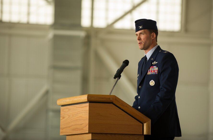 Col. Matthew Brooks, 5th Bomb Wing commander, speaks to Team Minot during the 5th BW change of command ceremony at Minot Air Force Base, N.D., June 3, 2016. Brooks is the 5th BW’s 54th commander. (U.S. Air Force photo/Senior Airman Apryl Hall)