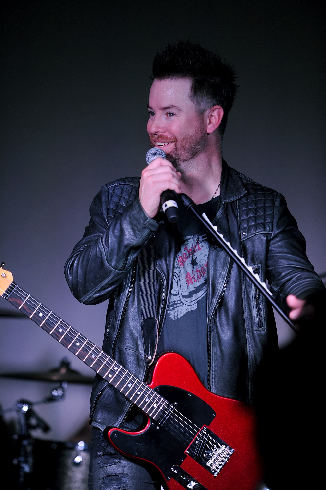David Cook and his band perform at the Jimmy Doolittle Center at Minot Air Force Base, N.D., May 30, 2016.  Cook is an American Idol winner and performed as part of his spring military base tour. (U.S. Air Force photo by Staff Sgt. Chad Trujillo)