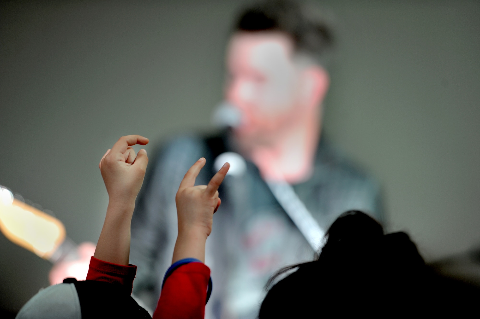 David Cook and his band perform at the Jimmy Doolittle Center at Minot Air Force Base, N.D., May 30, 2016.  Cook is an American Idol winner and performed as part of his spring military base tour. (U.S. Air Force photo by Staff Sgt. Chad Trujillo)