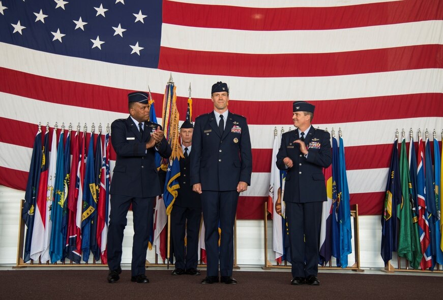 Col. Matthew Brooks accepts command of the 5th Bomb Wing during the 5th BW change of command ceremony at Minot Air Force Base, N.D., June 3, 2016. Brooks is the 54th commander of the 5th BW. (U.S. Air Force photo/Airman 1st Class Christian Sullivan)