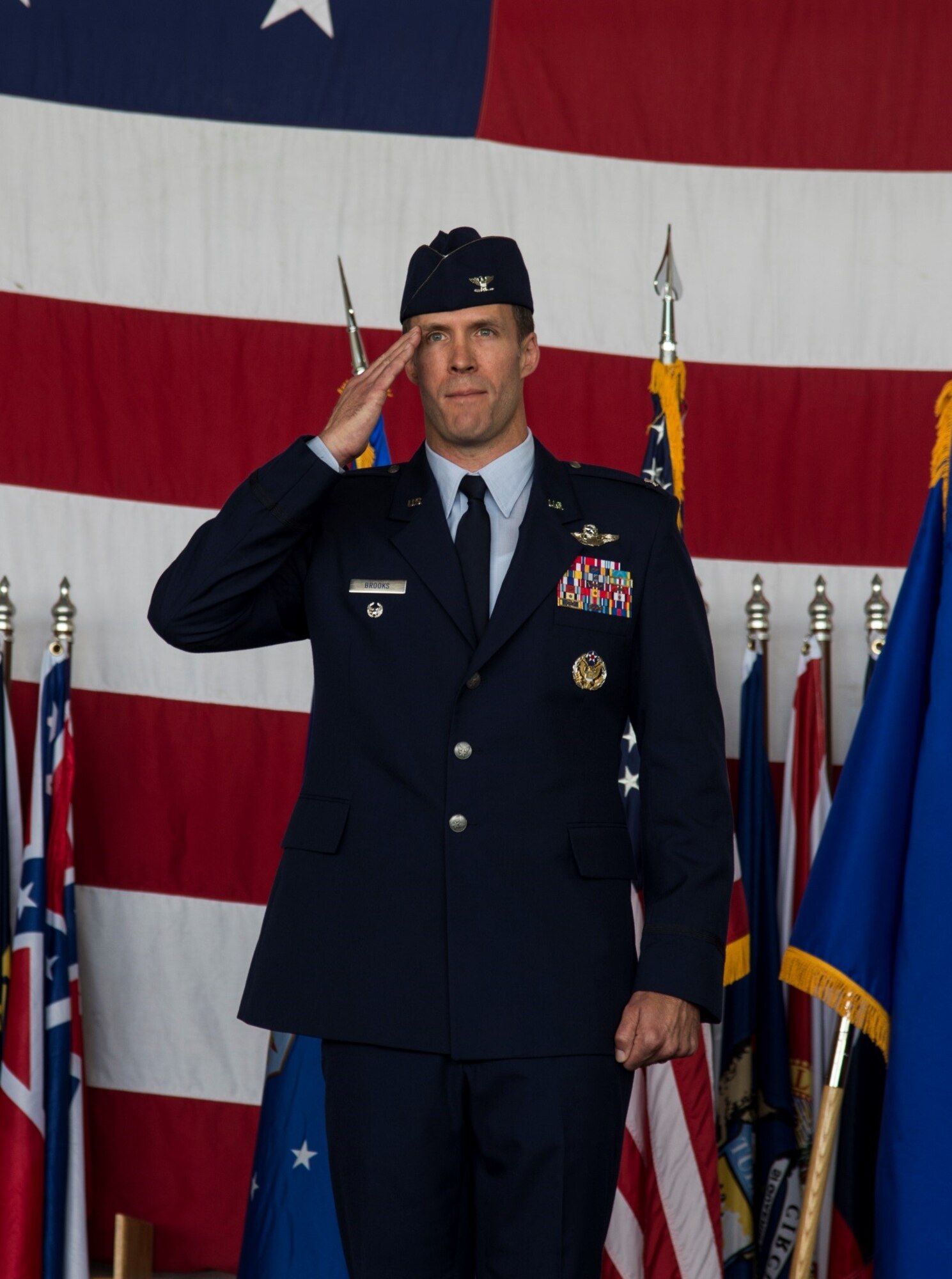 Col. Matthew Brooks gives his first salute as 5th Bomb Wing commander during the 5th BW change of command ceremony at Minot Air Force Base, N.D., June 3, 2016. Brooks came from Whiteman Air Force Base’s 509th Bomb Wing as the vice wing commander. (U.S. Air Force photo/Airman 1st Class Christian Sullivan)