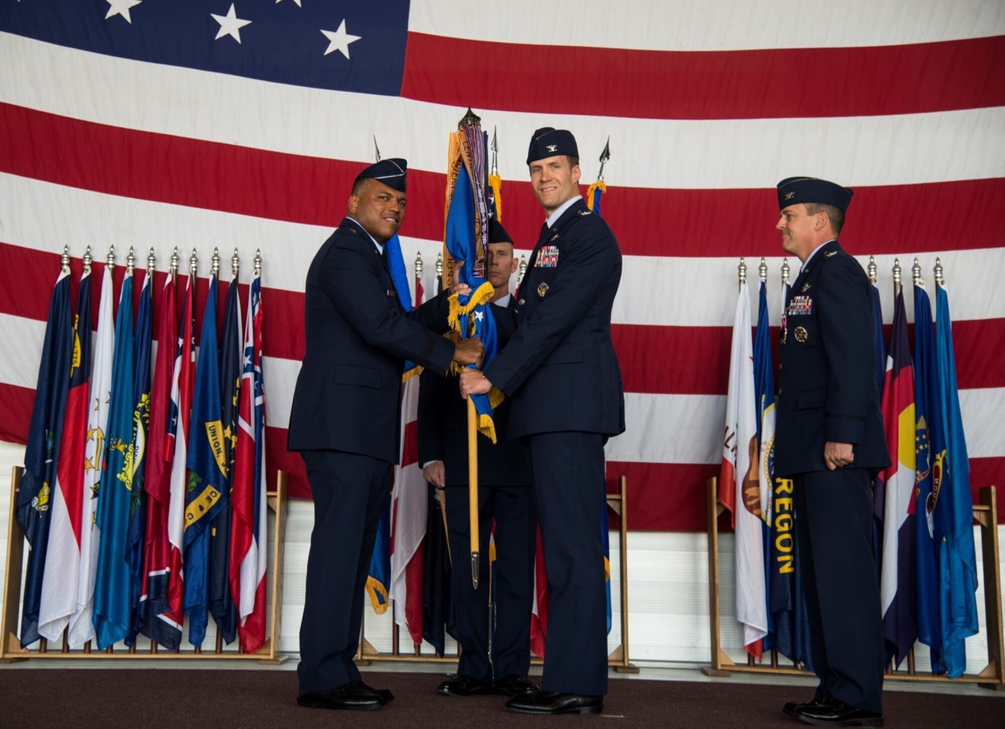 Col. Matthew Brooks accepts command of the 5th Bomb Wing during the 5th BW change of command ceremony at Minot Air Force Base, N.D., June 3, 2016. Brooks is the 54th commander of the 5th BW. (U.S. Air Force photo/Airman 1st Class Christian Sullivan)