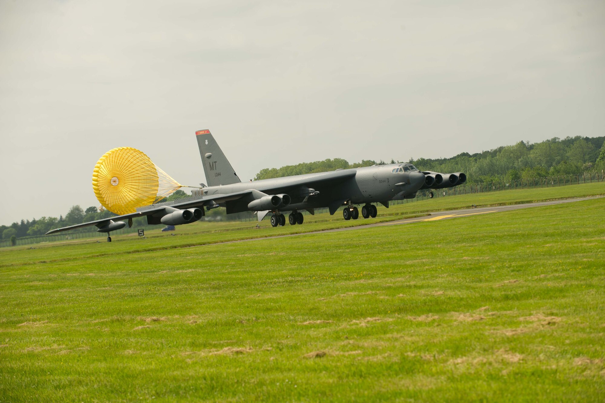 A B-52H Stratofortress from Minot Air Force Base, N.D., lands on the runway at Royal Air Force Fairford, United Kingdom, June 2, 2016. During the short term deployment, three strategic bombers are scheduled to conduct training flights with ground and naval forces around the region and participate in multinational exercises BALTOPS 16 and Saber Strike 16, and U.S. Africa Command’s Just Hammer. The bombers will integrate into several exercise activities, including air intercept training, mining operations, inert ordnance drops and close-air support. (U.S. Air Force photo/Senior Airman Sahara L. Fales)

