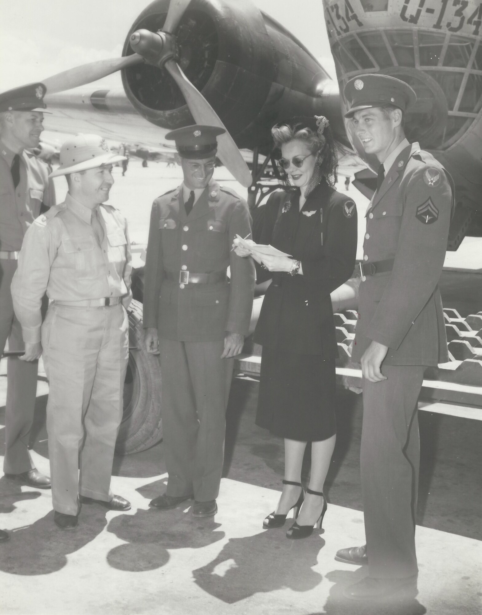 Then-Cpl. Arnold Ringstead, far right, meets actress Jane Wyman at Kirtland. Ringstead won a war bonds contest, with the prize of meeting Wyman. Ringstead was a member of the first cadre assigned to Kirtland Air Force Base. (Courtesy photo)