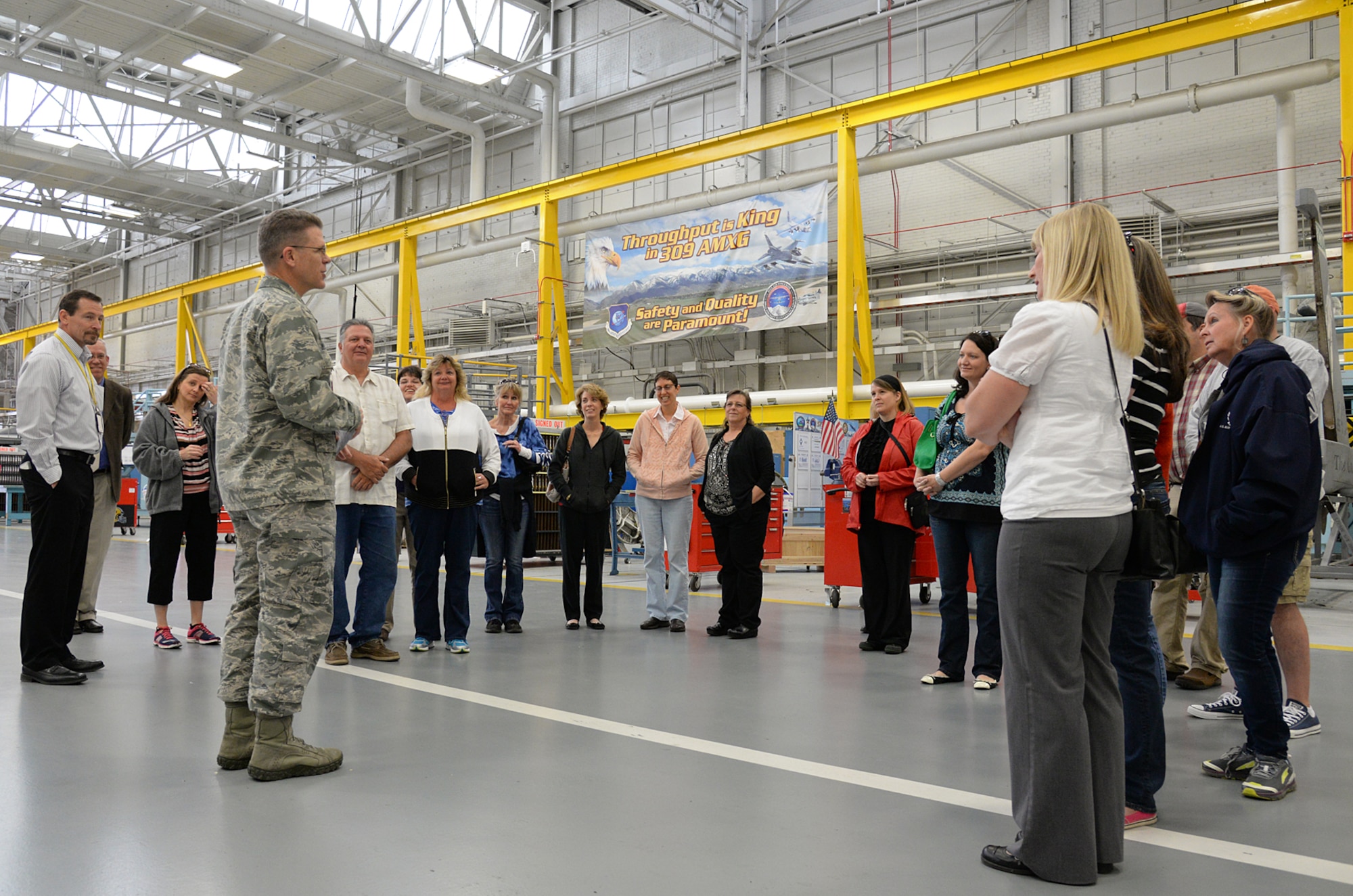 During the Team Hill spouses’ tour held May 25 at Hill Air Force Base, Utah, Brig. Gen. Steven J. Bleymaier, Ogden Air Logistics Complex commander, takes a few moments to thank a small group of spouses for the role that they play in providing support to our military. The tour gave spouses the opportunity to see and understand the importance of depot maintenance in support of the warfighter.  (U.S. Air Force Photo by Alex R. Lloyd)