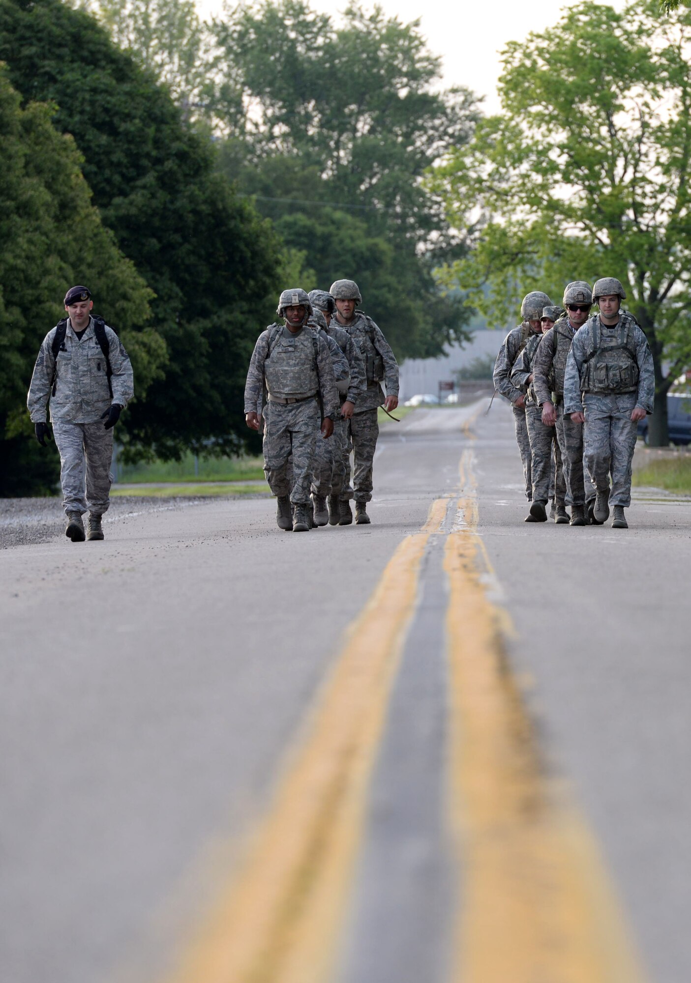 Security Forces members line up for a memorial ruck march during National Police Week  at Wright-Patterson Air Force Base. The Security Forces Squadron Installation held various events during National Police Week, from a static weapons display at National Museum of the U.S. Air Force to a golf tournament fundraiser at Twin Base golf club. (U.S. Air Force photo/Michelle Gigante)