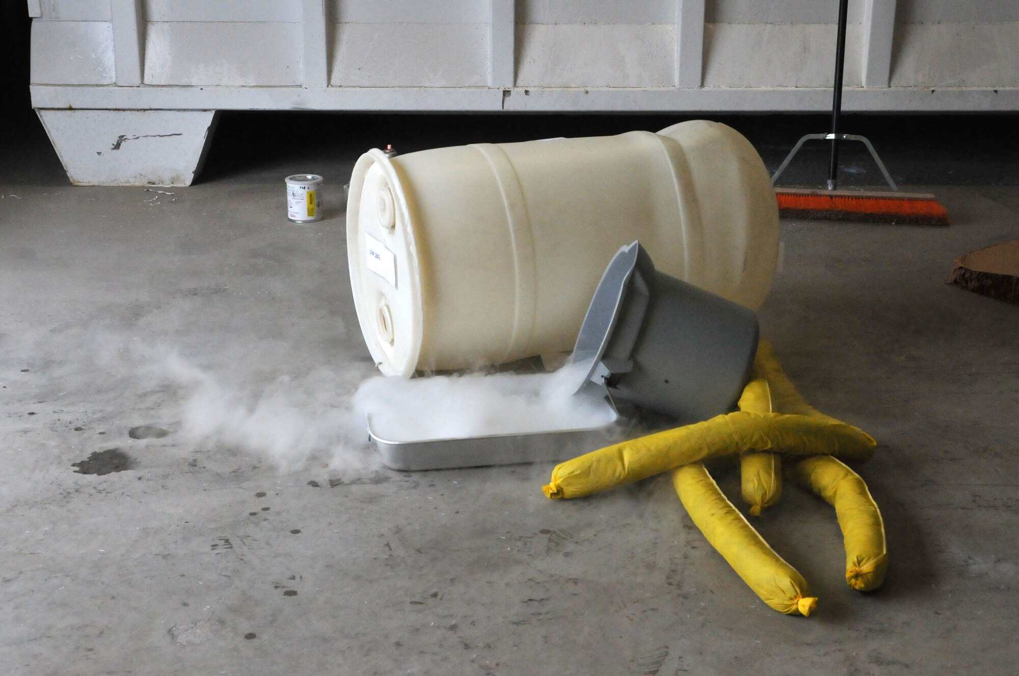 A simulated hazardous material spill is set up for students taking a Hazardous Waste Operations and Emergency Response (HAZWOPER) class at the 120th Airlift Wing in Great Falls Mont. May 20, 2016. The 120th AW offers a 40 hour course and 8 hour refresher course annually. (U.S. Air National Guard photo/Senior Master Sgt. Eric Peterson)