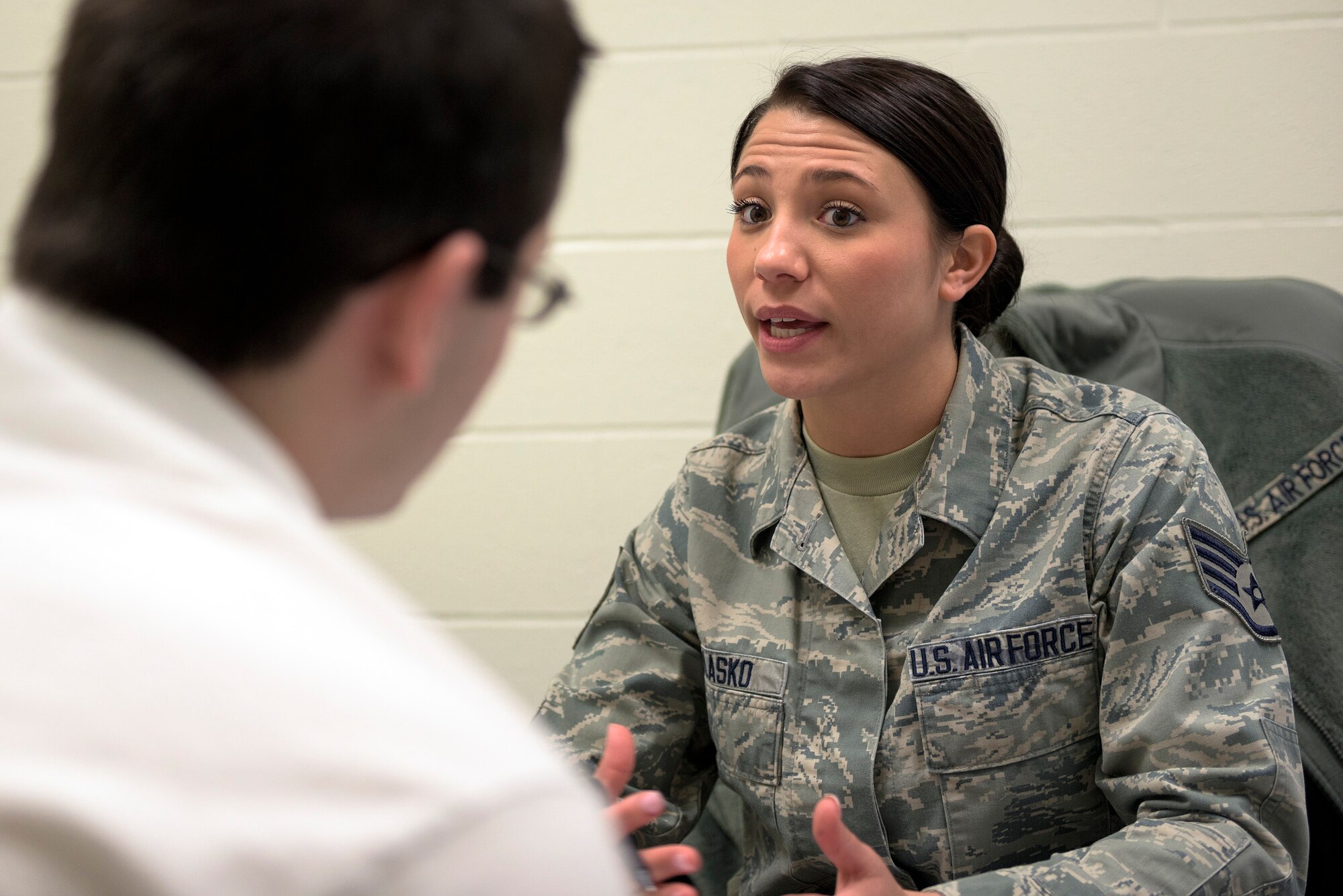U.S. Air Force Staff Sgt. Rachael L. Blasko, an enlisted accessions recruiter with the 182nd Force Support Squadron, Illinois Air National Guard, explains the enlistment process to a new recruit in Peoria, Ill., May 17, 2016. Blasko is the unit’s newest recruiter and has been serving in that role for two years. (U.S. Air National Guard photo by Staff Sgt. Lealan Buehrer)