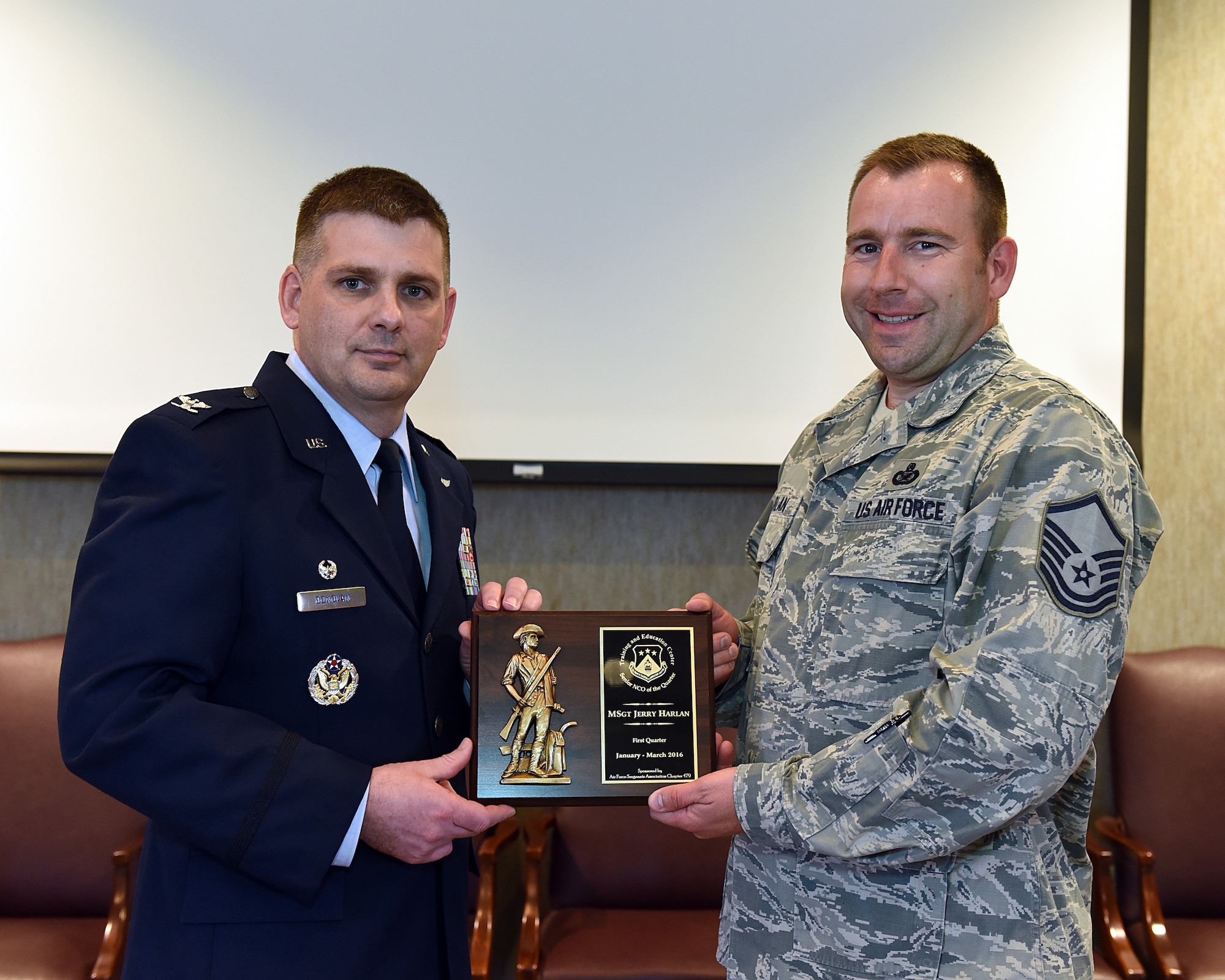 Master Sgt. Jerry Harlan is awarded the Senior NCO of the Quarter, June 2, 2016, at the I.G. Brown Training and Education Center in Louisville, Tenn., by Col. Kevin Donovan, commander, during a commander's call. (U.S. Air National Guard photo by Master Sgt. Mike R. Smith/Released)