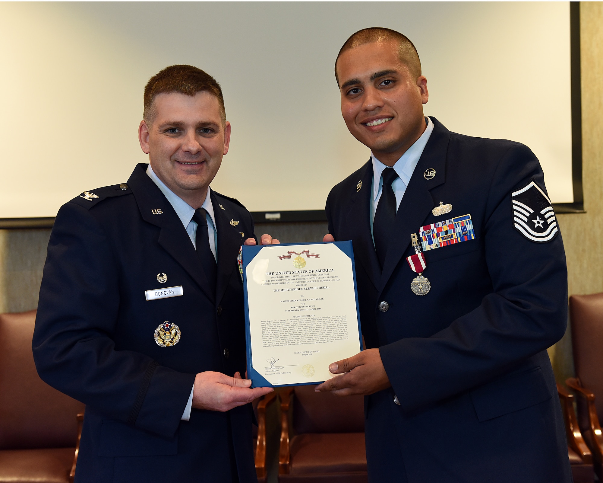 Master Sgt. Jose A. Santiago Jr. is presented the Meritorious Service Medal, June 2, 2016, at the I.G. Brown Training and Education Center in Louisville, Tenn., by Col. Kevin Donovan, commander, during a commander's call. (U.S. Air National Guard photo by Master Sgt. Mike R. Smith/Released)