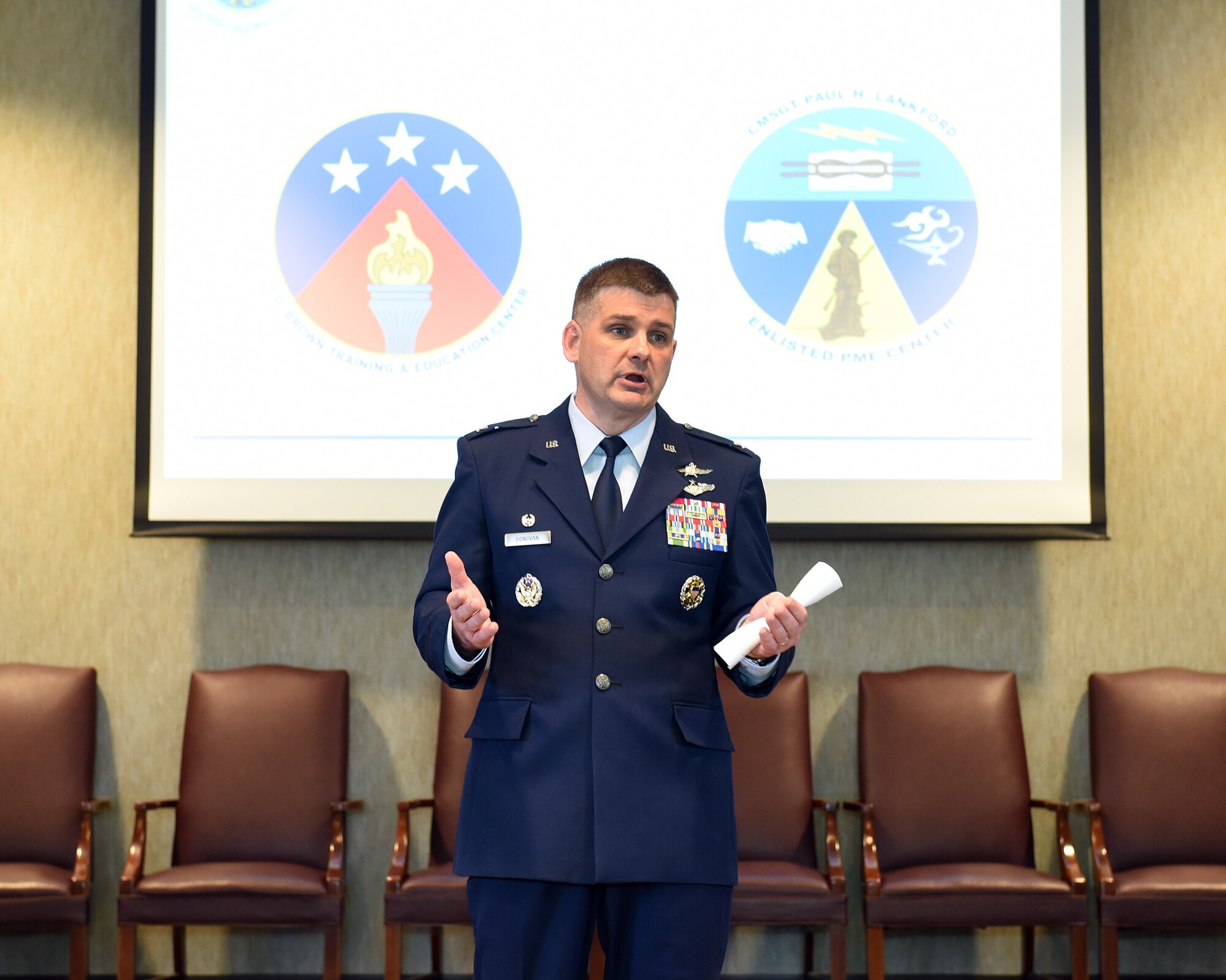 Col. Kevin Donovan, commander, I.G. Brown Training and Education Center in Louisville, Tenn., speaks with his staff about the center's revised official logos, among other topics discussed, June 2, 2016, during a commander's call. (U.S. Air National Guard photo by Master Sgt. Mike R. Smith/Released)