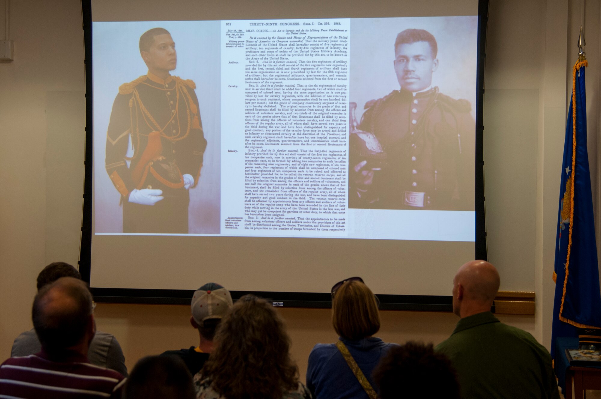 Warren ICBM & Heritage Museum guests look at a presentation about Buffalo Soldiers delivered by John Langellier, Ph.D., consulting historian, June 1, 2016, in the Warren ICBM & Heritage Museum on F.E. Warren Air Force Base, Wyo. The presentation is a way to honor the Buffalo Soldiers’ legacy and recognize the base’s heritage. (U.S. Air Force photo by Senior Airman Jason Wiese)