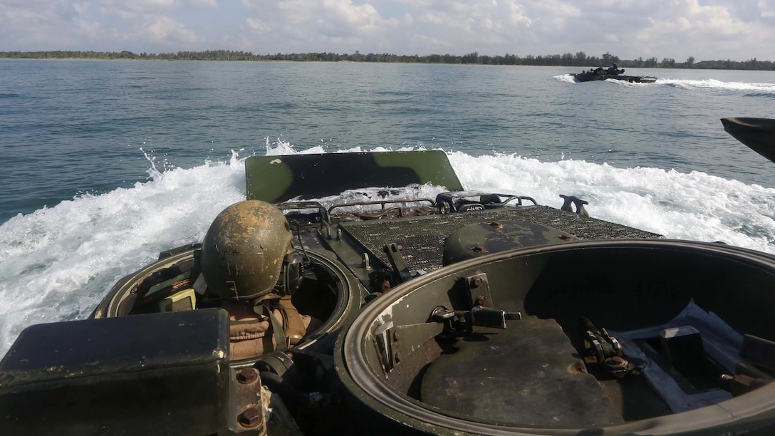 DAU.S. Marines embarked aboard the forward-deployed Whidbey Island Class dock landing ship USS Ashland (LSD 48) , engage in an amphibious transition from ship to shore in support of exercise Cooperation Afloat Readiness and Training at the Darvel Bay, Malaysia, May 30, 2016. CARAT is a series of annual, bilateral maritime exercises between the U.S. Navy, U.S. Marine Corps and the armed forces of nine partner nations to include Bangladesh, Brunei, Cambodia, Indonesia, Malaysia, Singapore, the Philippines, Thailand and Timor-Leste.  The Marines are assigned to Easy Company, 2nd Battalion, 2nd Marines.