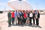 U.S. Air Force Col. Lloyd Buzzell, U.S. Strategic Command (USSTRATCOM) global watch division chief (left), poses for a photo with University of Nebraska Omaha (UNO) Executive Master of Business Administration (EMBA) program participants, alumni and leaders in front of an E-6B Airborne Command Post (ABNCP) aircraft at Offutt Air Force Base, Neb., June 3, 2016. While here, the visiting group toured USSTRATCOMâ€™s global operations center and the E-6B ABNCP aircraft, and received a command mission briefing from U.S. Air Force Maj. Gen. Richard J. Evans III, mobilization assistant to the USSTRATCOM deputy commander (not pictured). One of nine DoD unified combatant commands, USSTRATCOM has global strategic missions, assigned through the Unified Command Plan, which include strategic deterrence; space operations; cyberspace operations; joint electronic warfare; global strike; missile defense; intelligence, surveillance and reconnaissance; combating weapons of mass destruction; and analysis and targeting. (Courtesy photo)