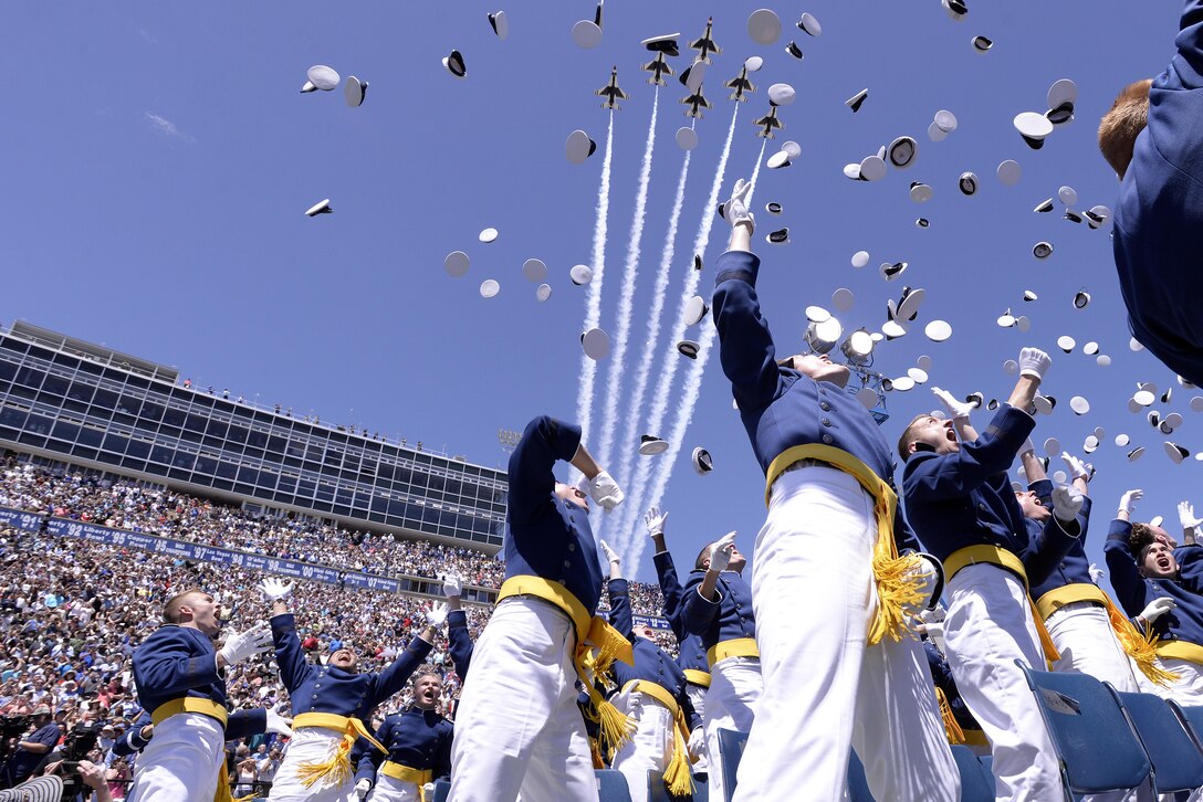 More than 800 cadets toss their hats as the Thunderbirds fly over the graduation ceremony for the Class of 2016 at the U.S. Air Force Academy in Colorado Springs, Colo., June 2, 2016. The cadets became the Air Force's newest second lieutenants. The Thunderbirds are the Air Force's demonstration team. Air Force photo by Mike Kaplan