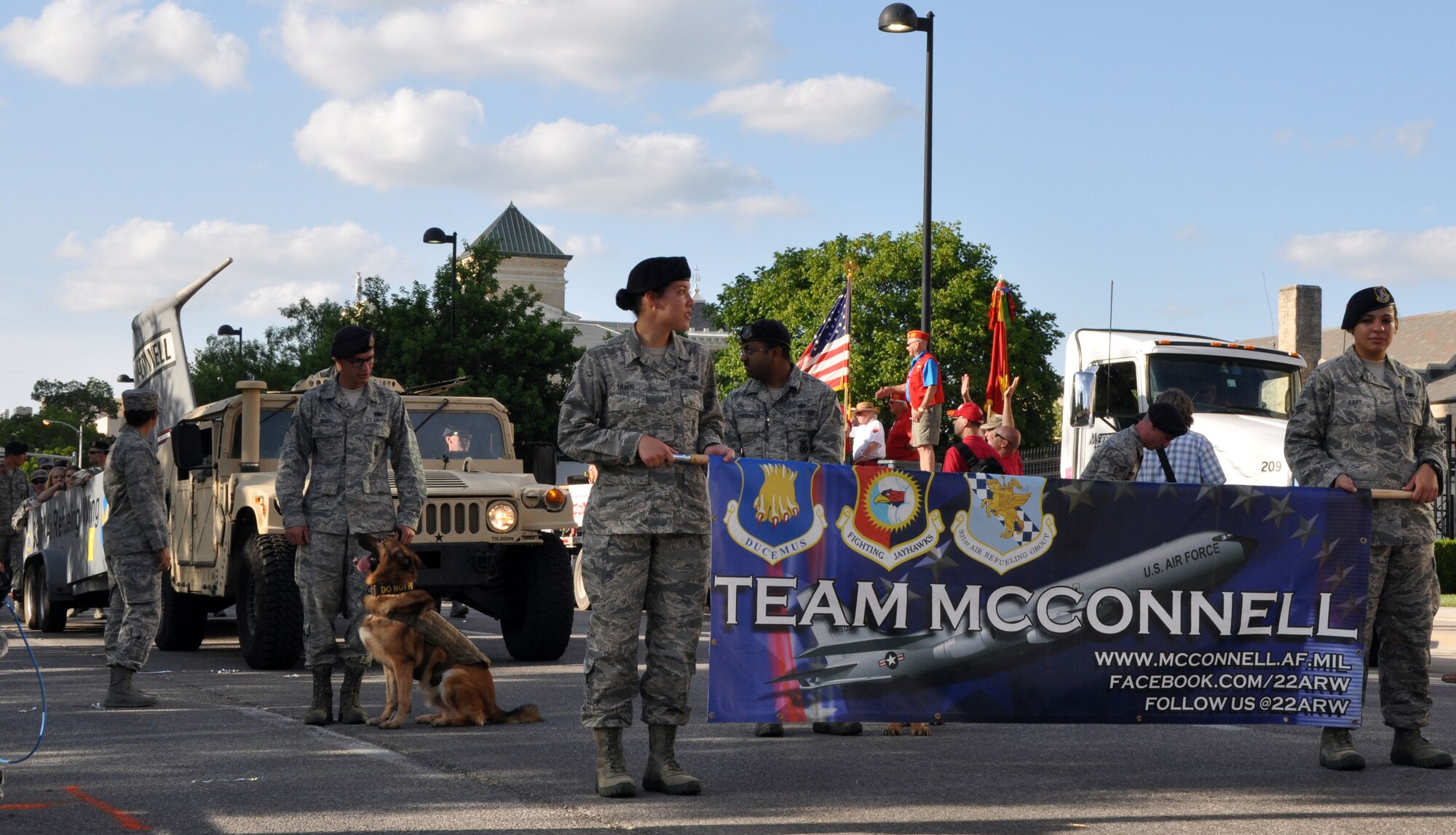 More than 30 Airmen from Team McConnell participated in the Sundown Parade to help kick off Wichita's 2016 Riverfest celebration on June 3. Team McConnell members took the opportunity throughout the parade to thank community members for their support! (U.S. Air Force photo by Tech. Sgt. Abigail Klein)
