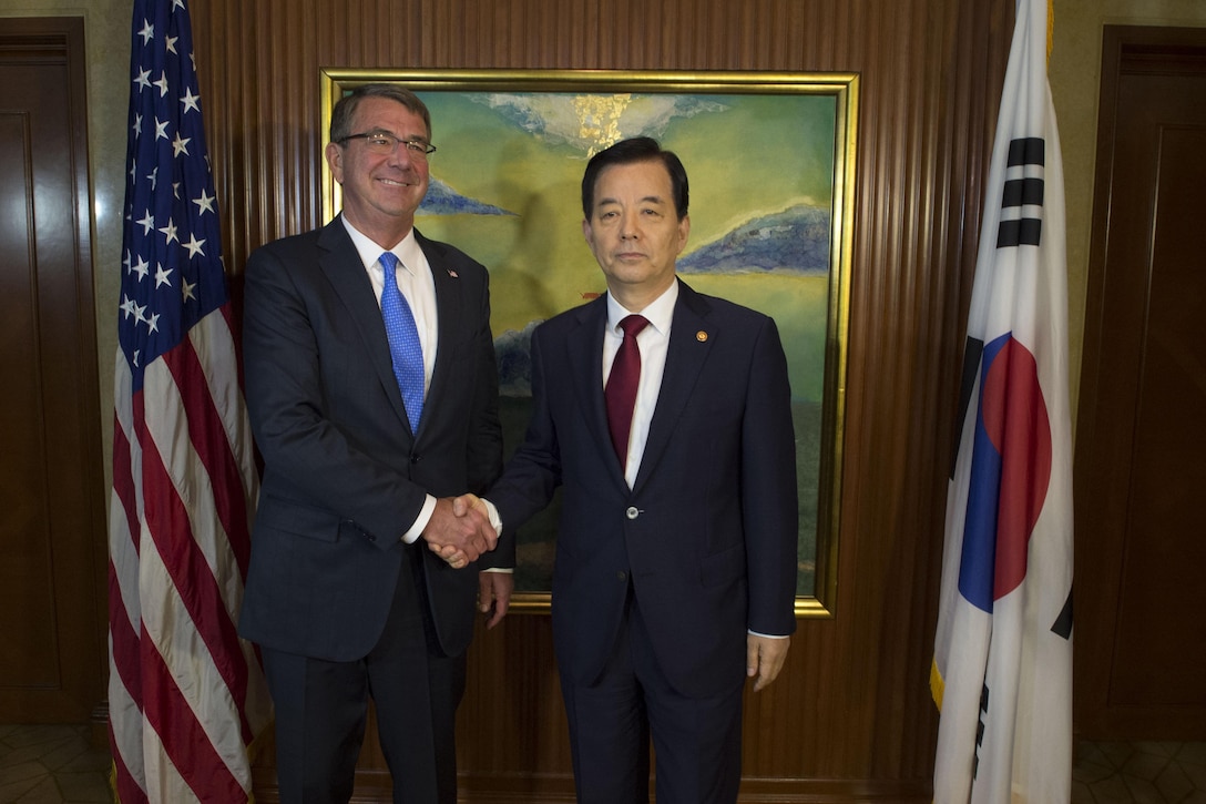 Defense Secretary Ash Carter poses for a photo with Republic of Korea Defense Minister Han Min-koo prior to a bilateral meeting in Singapore, June 4, 2016. DoD photo by Navy Petty Officer 1st Class Tim D. Godbee