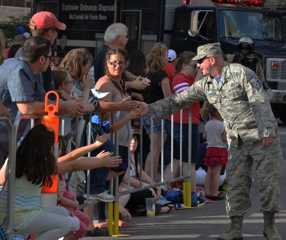 For forty years, native Kansans have gathered every spring to celebrate community pride and fellowship. The celebration, known by many names over the decades, has evolved into family fun, music, entertainment and food known today as the Wichita River Festival. More than 30 Airmen from Team McConnell participated in the Sundown Parade to help kick off Wichita's 2016 Riverfest celebration on June 3.

