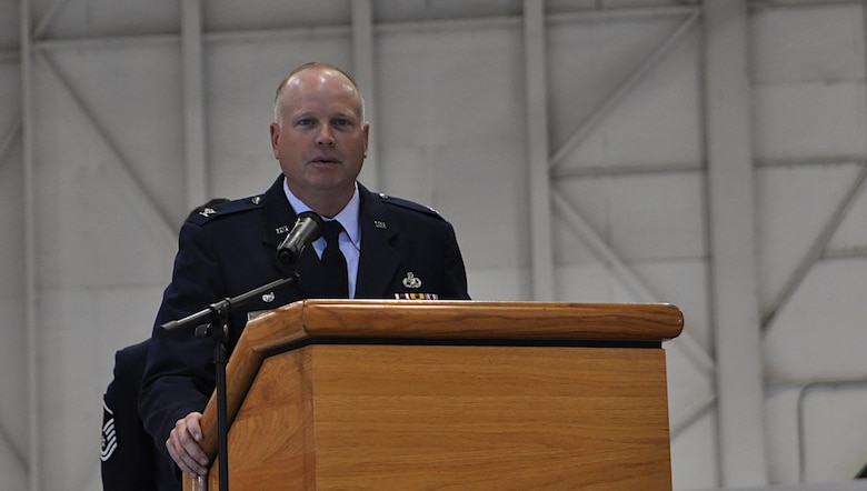 Col. Mark S. Larson, 931 Air Refueling Wing commander, speaks to Team McConnell members, during an activation and assumption of command ceremony June 4, 2016, in Hangar 1107 at McConnell Air Force Base, Kansas. The 931 MXG is slated to receive approximately 200 additional personnel and be responsible for maintenance of the KC-46 Pegasus. (U.S. Air Force photo by Senior Airman Preston Webb)