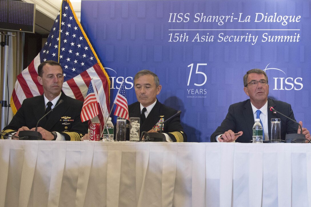 Defense Secretary Ash Carter, left, Chief of Naval Operations Adm. John M. Richardson, right, and U.S. Pacific Command commander Navy Adm. Harry B. Harris Jr. speak to reporters in Singapore, June 4, 2016. DoD photo by Navy Petty Officer 1st Class Tim D. Godbee