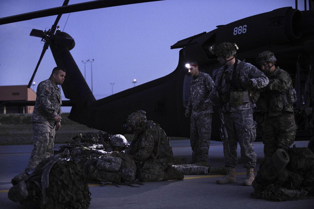 Soldiers prepare for an air assault training at Fort Drum, N.Y., May 18, 2016. Air Force photo by Staff Sgt. Ryan Campbell