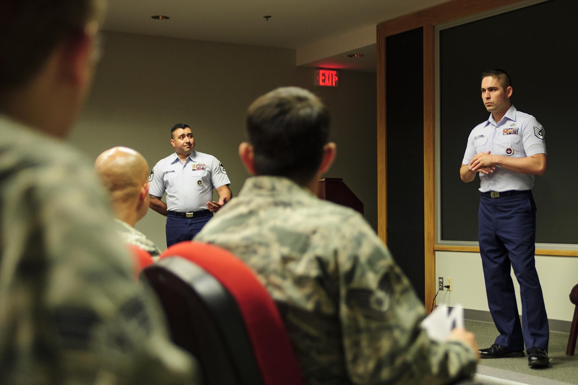 Tech. Sgt. Robert Hemingway and Master Sgt. Jose Rodriguez, both military training instructors with the 433rd training squadron at JB San Antonio-Lackland, Texas, provide information to instrested MTI canidates during a briefing June 5, 2016 at Joint Base Charleston, South Carolina. The MTI recruiting team was conducting a nationwide search for new military training instructors from the Air Force Reserve (U.S. Air Force photo by Senior Airman Jonathan Lane).