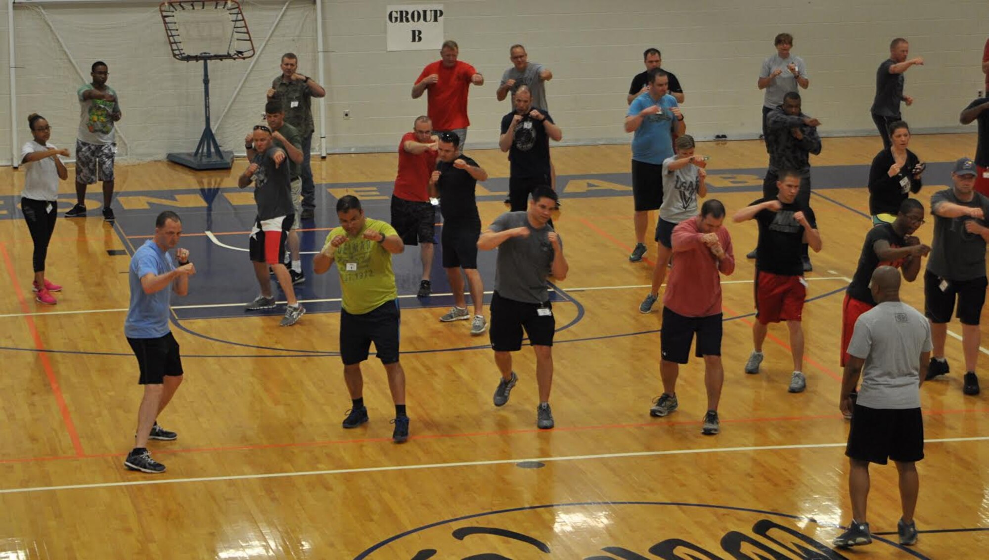 Citizen Airmen with the 931st Air Refueling Wing learn to box during Wingman Day, which focused on resiliency, June 5, 2016, at McConnell Air Force Base, Kans. To prevent physical training from becoming monotonous, Airmen learned new methods to stay fit. (U.S. Air Force photo by Senior Airman Preston Webb)