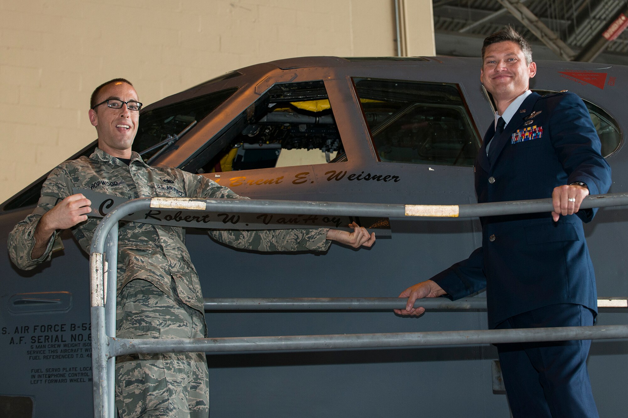 U.S. Air Force Staff Sgt. Phillip Hopwood unveils the newly appointed 93rd Bomb Squadron Commander’s designated B-52 Stratofortress with Lt. Col. Brent Weisner’s name at Barksdale Air Force Base, La., June 3, 2016. Hopwood is assigned to the 2nd Aircraft Maintenance Squadron and works with the 307th Aircraft Maintenance Squadron as part of the Total Force Integration. (U.S. Air Force (U.S. Air Force photo by Master Sgt. Greg Steele/Released)