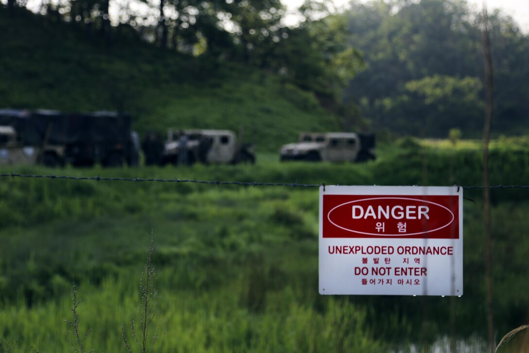 U.S. Marine and U.S. soldier Explosive Ordnance Disposal technicians conduct operational area clearance, May 22, 2016, at a Montana Range, South Korea. During Korea EOD Exercise, the service members practiced how to safely dispose of unexploded ordnance. EOD technicians specialize in rendering safe explosives for the security of property and personnel across the military. Soldiers are with 718th EOD Company, 23rd Chemical Battalion, 2nd Infantry Division. Marines are with 3rd EOD Company, 9th Engineer Support Battalion, 3rd Marine Logistics Group, III Marine Expeditionary Force. (U.S. Marine Corps photo by Cpl. Isaac Ibarra/Released)