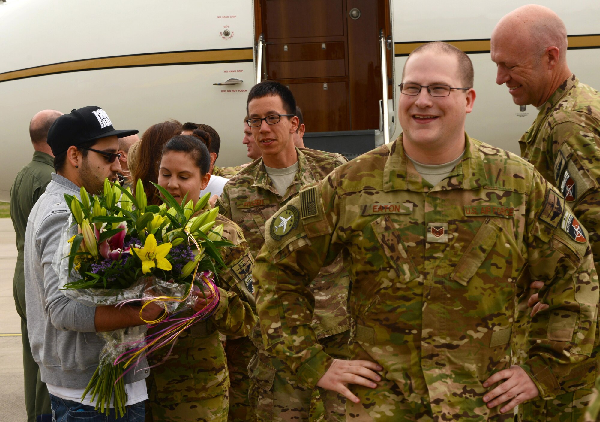 Members of a C-20H Gulfstream IV detachment disembark from their aircraft as they arrive at Ramstein Air Base, Germany, June 1, 2016.  Airmen were welcomed by their families and loved ones as they returned from their deployment. (U.S. Air Force Photo/ Airman 1st Class Joshua Magbanua)