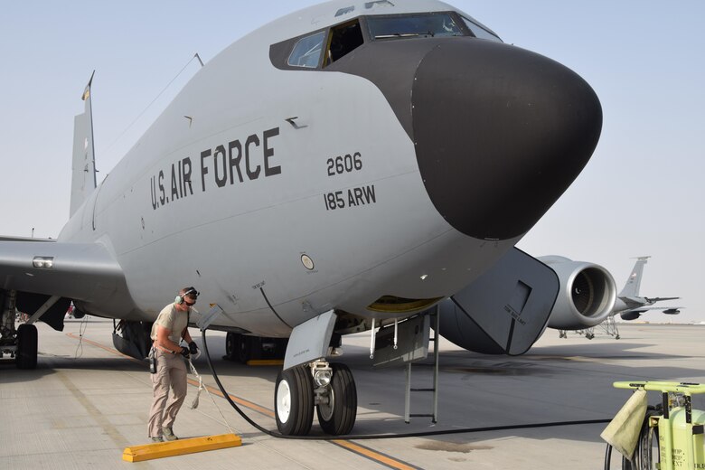 Staff Sgt. Ryan Feeney, 340th Expeditionary Aircraft Maintenance Unit crew chief, places a tire chalk in front of a KC-135 Stratotanker before an upcoming mission June 1, 2016, at Al Udeid Air Base, Qatar. Airmen from the 340th AMU conduct repairs and perform a variety of maintenance tasks to prepare the aircraft for in-air refueling missions. Feeney is attached to the 379th Air Expeditionary Wing and hails from Bangor Air National Guard Base, Maine. (U.S. Air Force photo by Technical Sgt. Carlos J. Trevino/Released)